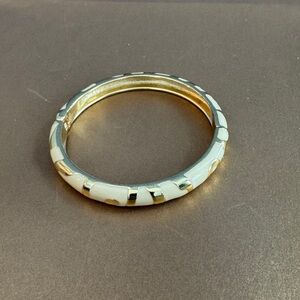 ***SOLD*** Cream enamel and goldtone bracelet clamper size ~8-8.5